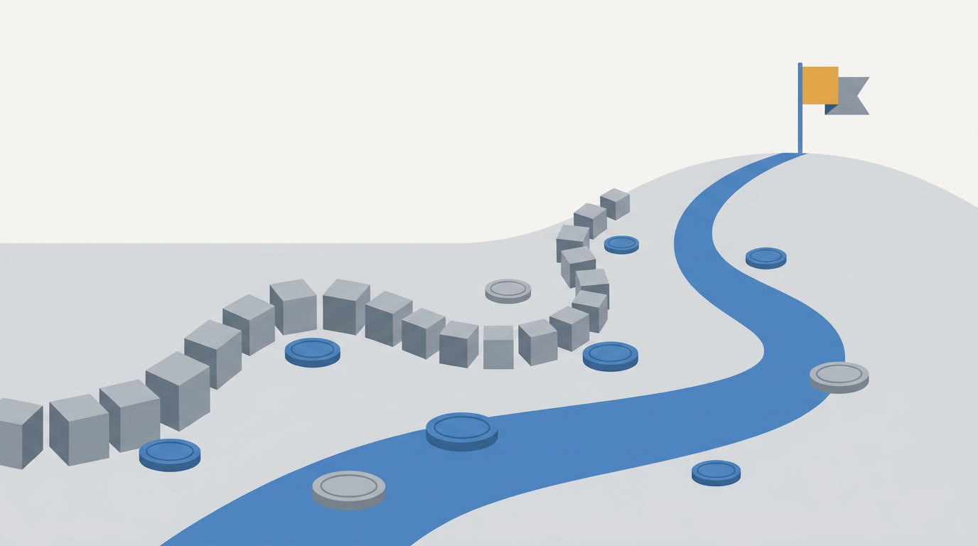 A flat illustration of two paths across a simple map, one made of stacked building blocks and the other of a solid road, meeting at a small flag, with coins scattered along each, grey and blue palette with one warm amber accent